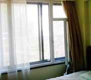 Bedroom 4 Home Inns- Baita Kunming