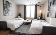 Bedroom 2 MTLVacationRentals - The MTL Zoo