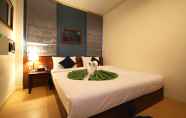 Kamar Tidur 4 Lemonade Boutique Inn