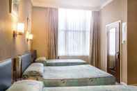 Kamar Tidur Mitre House Hotel