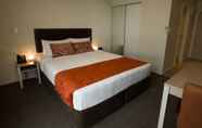Bedroom 7 Ramada Suites Christchurch City