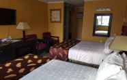 ห้องนอน 7 Alpine Inn & Suites