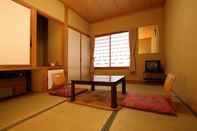 ห้องนอน Kusatsu Onsen Pension Mitomo