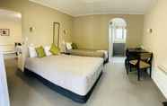 ห้องนอน 6 Kingswood Manor Motel