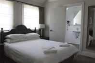 Kamar Tidur Wallacia Hotel