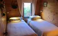 Kamar Tidur 6 Edelweiss Cottage B&B