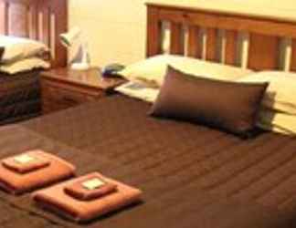 Kamar Tidur 2 Auburn Shiraz Motel