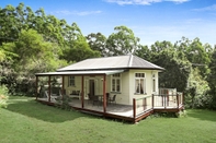 Phòng ngủ Avalon Noosa Farm Cottages