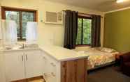 Bedroom 7 Lake Eacham Tourist Park & Self Contained Cabins