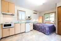 Kamar Tidur Clog Barn Caravan Park