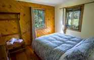 ห้องนอน 5 Wisteria Cottage and Cabins
