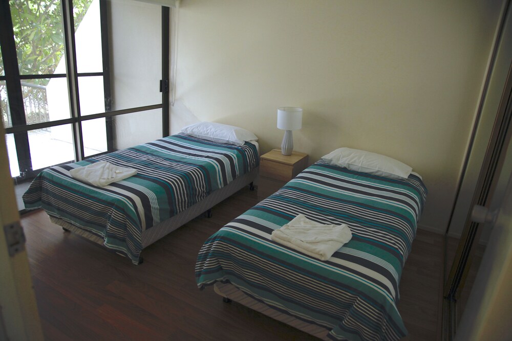 Kamar Tidur 5 Sandrift Beachfront Apartments