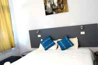 Kamar Tidur Mercury Motor Inn