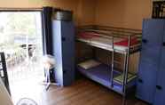 Kamar Tidur 4 Boardrider Backpacker & Budget Motel