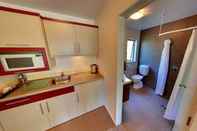 Phòng tắm bên trong Tresori Motor Lodge