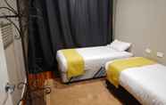 Kamar Tidur 5 Manera Heights Apartment Motel