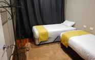 Bilik Tidur 5 Manera Heights Apartment Motel