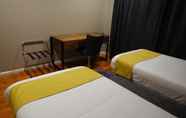 Kamar Tidur 4 Manera Heights Apartment Motel