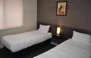 Bilik Tidur 6 Brougham Arms Hotel