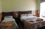 ห้องนอน 4 Snug as a Bug Motel
