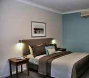 Bedroom 6 Pastoral Hotel Motel