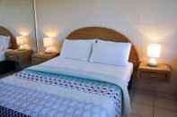 Kamar Tidur Palm Waters Holiday Villas