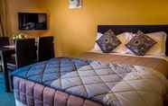 ห้องนอน 7 Malones Motel
