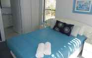 ห้องนอน 4 Kalua Holiday Apartments