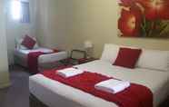 Bedroom 7 Econo Lodge Chaparral Motel Ballina