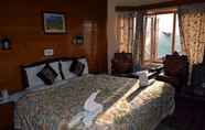 Bedroom 4 Welcome Hotel at Gulmarg