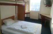 Bedroom 2 Motel 24h Bremen Ost