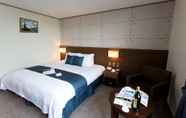 Kamar Tidur 3 Benikea Hotel Jeju