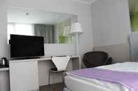 Bilik Tidur Hotel City Lugano, Design & Hospitality