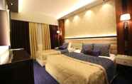 Bedroom 4 Prestige Hotel