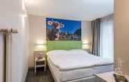 ห้องนอน 2 Adhhoc Hotel