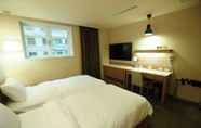 Kamar Tidur 5 Kindness Hotel Sanduo Shopping District