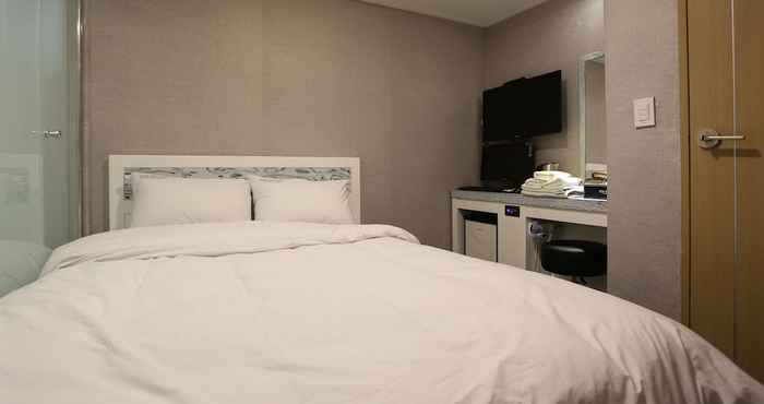 ห้องนอน Top Hotel Myeongdong