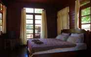 Kamar Tidur 4 Thai House Beach Resort