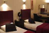 Kamar Tidur Sandyford Hotel