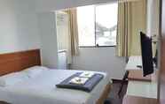 ห้องนอน 3 HT Suites Mobiliadas