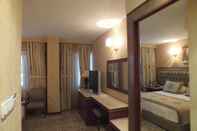 Bedroom Grand Asiyan Hotel
