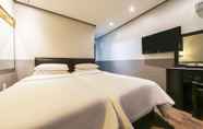 Bedroom 7 Friendly DH Naissance Hotel by Mindrum Group