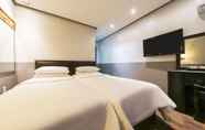 Bedroom 7 Friendly DH Naissance Hotel by Mindrum Group