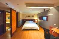 Bedroom Friendly DH Naissance Hotel by Mindrum Group