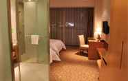 Bilik Tidur 4 Metropolo Jinjiang Wanda Plaza Hotel