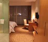 Kamar Tidur 4 Metropolo Jinjiang Wanda Plaza Hotel