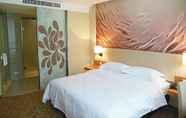 Phòng ngủ 3 Metropolo Jinjiang Wanda Plaza Hotel