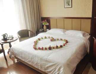 Bedroom 2 Dalian Sanhe Hotel