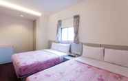Bedroom 4 Ruei Gung Business Hotel