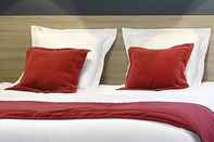 Kamar Tidur Lille City Hotel